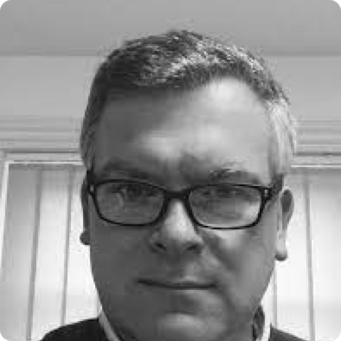 Headshot of Andrew Coates.